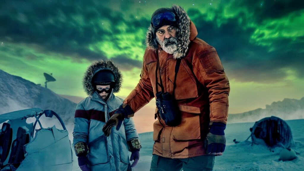 Man and girl, bundled up against the cold, walking across a frozen tundra