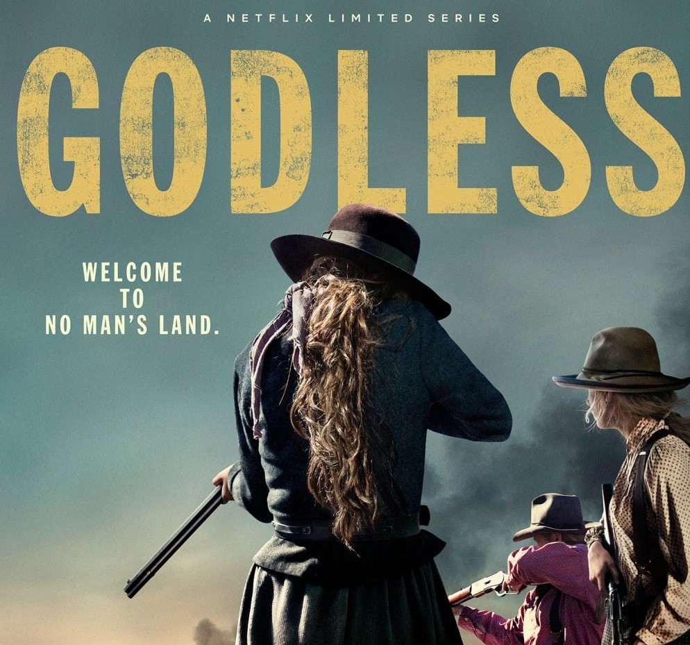 Title: Godless, photo of a woman holding a shotgun