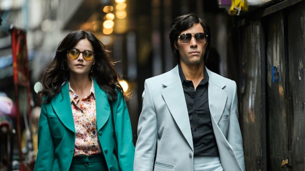 A stylish 1970s couple walking together