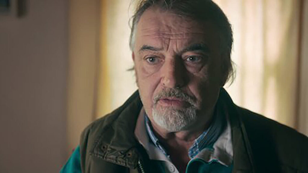 Prime suspect, Ian bailey - a 50-something year old man sitting in a darkened room